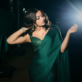 Rashmika Mandanna's bewitching look in Amit Aggarwal's custom emerald green saree and blouse is an unmissable fashion statement