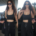 Disha Patani’s airport look in cropped tank top and black track pants defines comfortable travel fashion