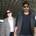 Katrina Kaif redefines airport fashion in oversized trench coat paired with formal shirt and jeans, spotted with Vicky Kaushal 