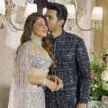 Armaan Malik-Aashna Shroff Wedding Reception: Newlyweds redefine elegance as they pose happily on their big day: WATCH