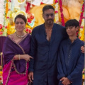 WATCH: Kajol pinching Ajay Devgn to pose for perfect family picture at Durga Puja pandal is every poser wife ever; Son Yug’s reaction is UNMISSABLE