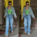 Alia Bhatt adds splash of color to her casual denim-on-denim look with a green tank top