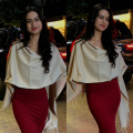 Nysa Devgn pairs her red bodycon dress with a shawl for the perfect cozy-chic look 