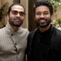 INSIDE PICS: Dhanush and Silambarasan TR make a rare appearance together for a producer’s wedding event; share a sweet hug