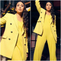 Karisma Kapoor’s yellow jumpsuit with oversized blazer is corporate-core class with a bright and bold twist