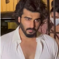 WATCH: Arjun Kapoor helps grieving Malaika Arora reach her car as she exits mother's house after father's demise; Kareena Kapoor joins