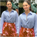 Ananya Panday shows us how to party in striped blue shirt with orange sequined mini skirt and shiny heels