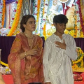 Mommy Kajol holds son Yug by his arm as they seek blessings of Maa Durga at pandal; netizens go gaga: WATCH