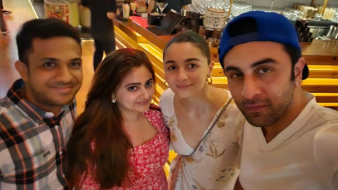 Alia Bhatt-Ranbir Kapoor twin again; Couple looks chic in white outfits as they pose with fans in Dubai | PINKVILLA